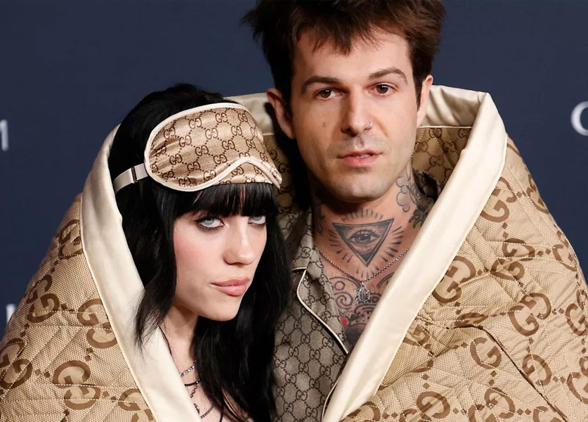 Billie Eilish and her Partner Wrapped in a Gucci blanket on the Red Carpet Billie Eilish and her Partner Wrapped in a Gucci blanket on the Red Carpet