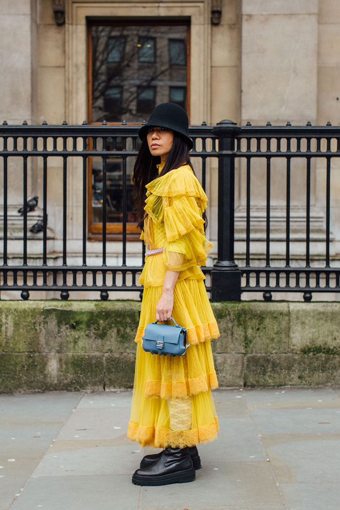 Guest-wearing-yellow-dress-at-London-Fashion-Week-Fall-2020