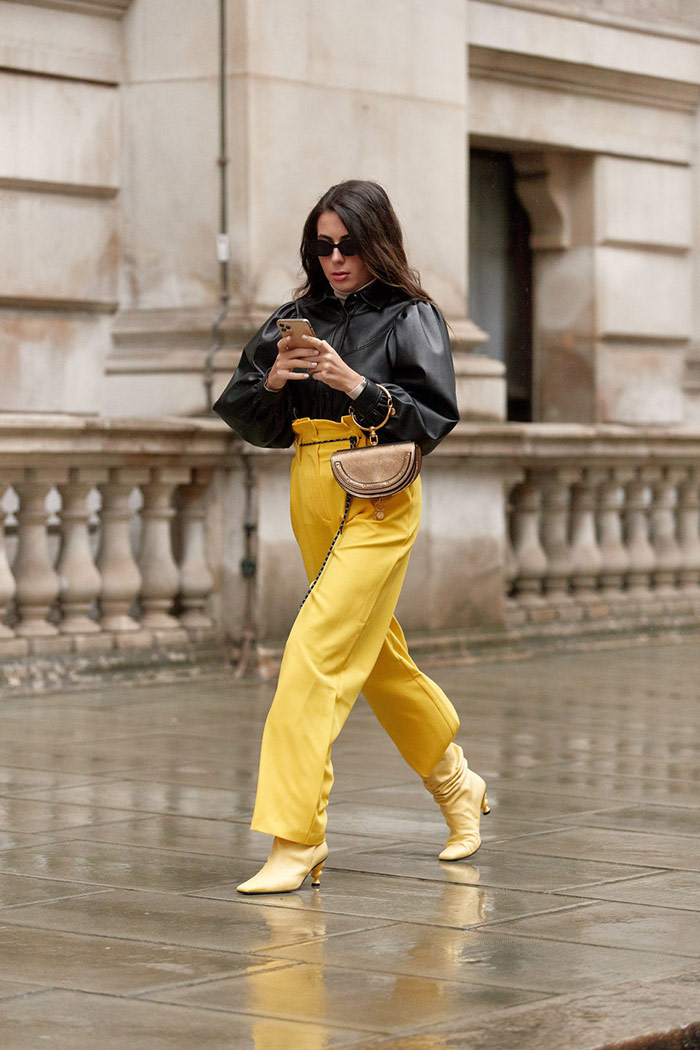 Guest-wearing-yellow-pants-at-London-Fashion-Week-Fall-2020