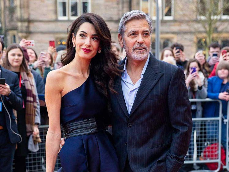 Amal and George Clooney in matching outfits