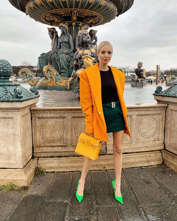 Leonie Hanne-wearing orange blazer
