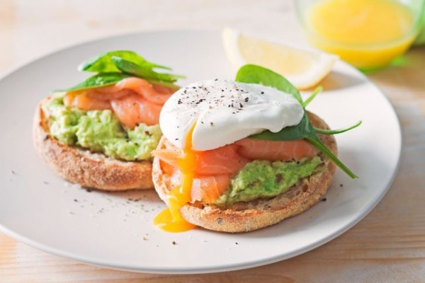 English muffin with avocado and salmon