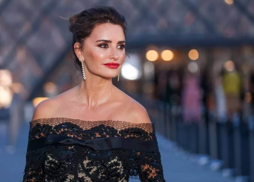 Penélope Cruz lights up the Louvre in a lace jumpsuit at the Lancôme event