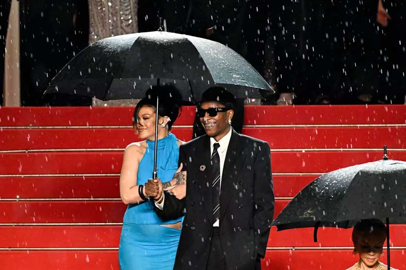 Under the Umbrella Rihanna and A$AP Rocky in Rainy Cannes Under the Umbrella Rihanna and A$AP Rocky in Rainy Cannes
